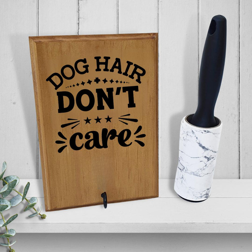 'Dog hair don't care' lint roller holder with lint roller