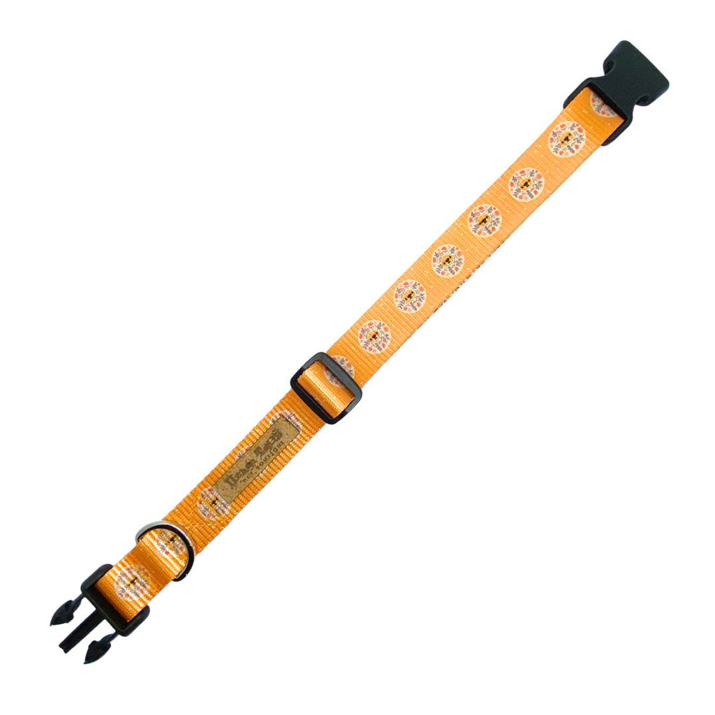 Yellow dog collar with floral lions and quick release buckle