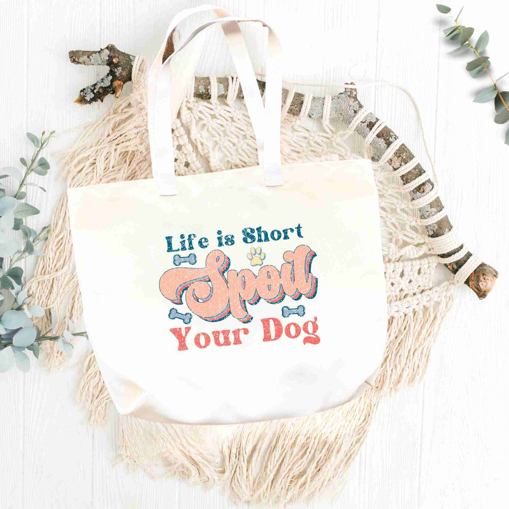 'life is short, spoil you dog' tote bag flatlay 