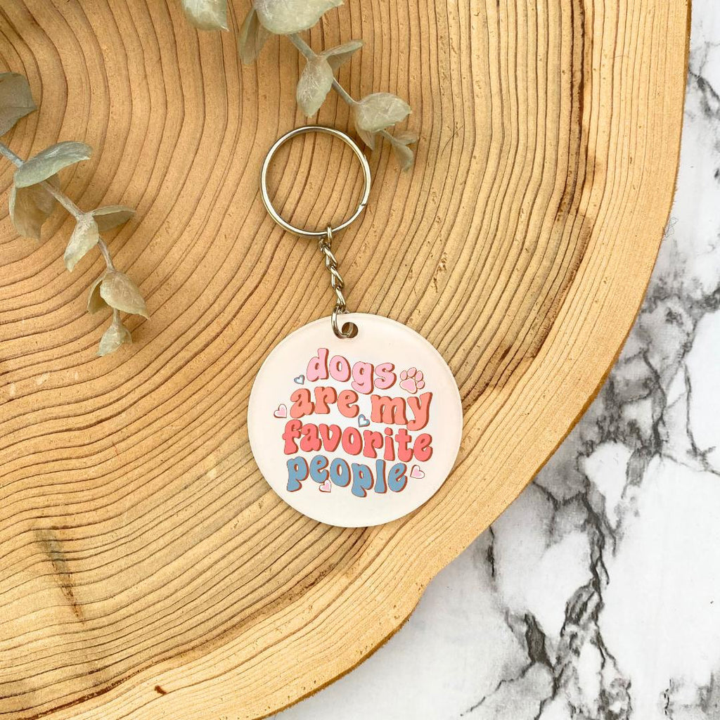 Dogs are my favourite people acrylic keyring - wooden background