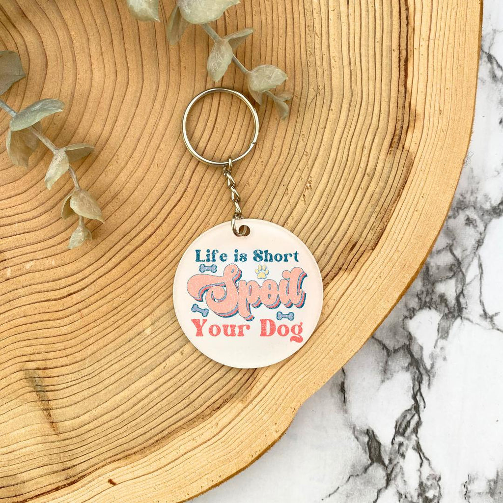 'Life is Short, Spoil your Dog' acrylic keyring - wooden background