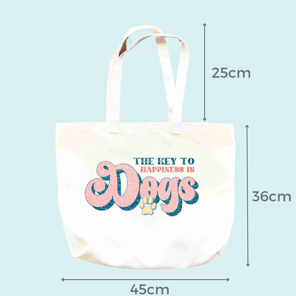 dimensions of 'The key to happiness is dogs' tote bag
